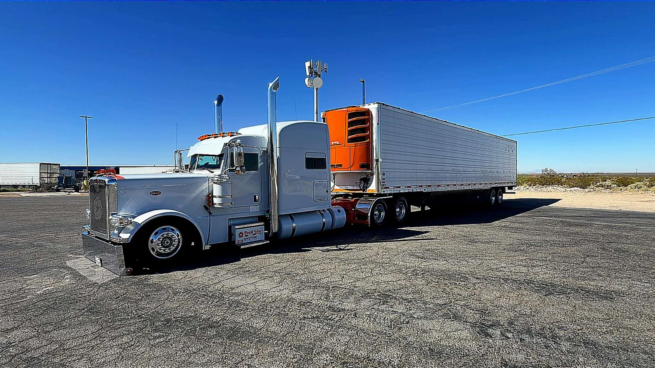 Side profile of the Rockstar Trucking Peterbilt and 53-foot reefer